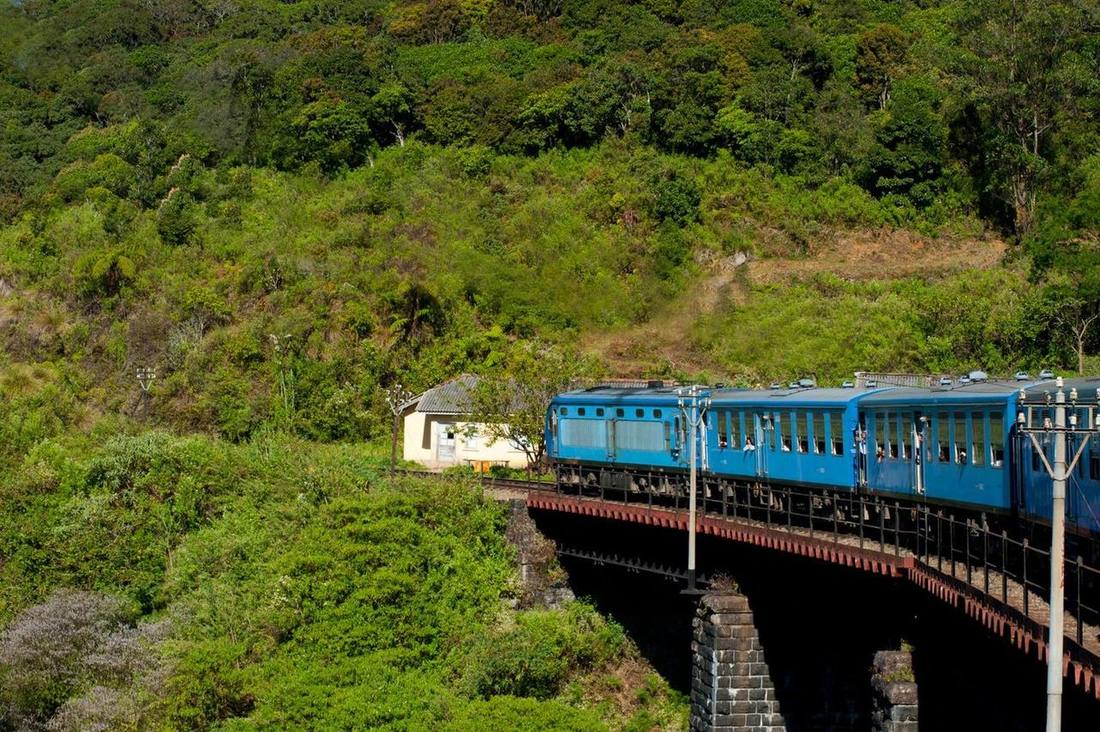 Blue train in the hills