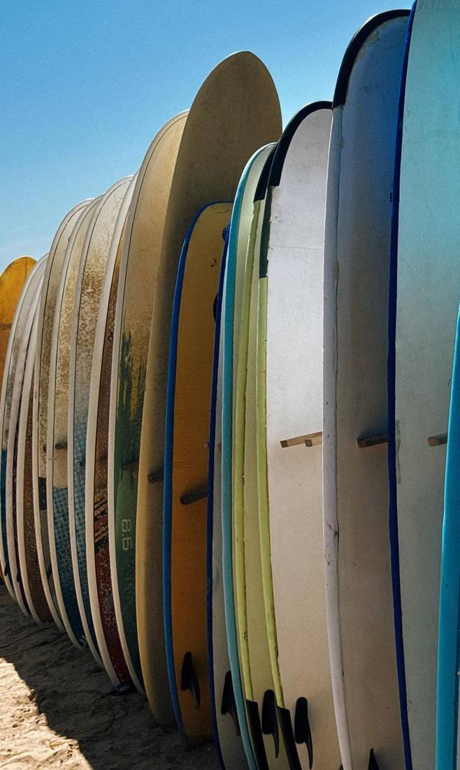 Colourful surfboards on the beach
