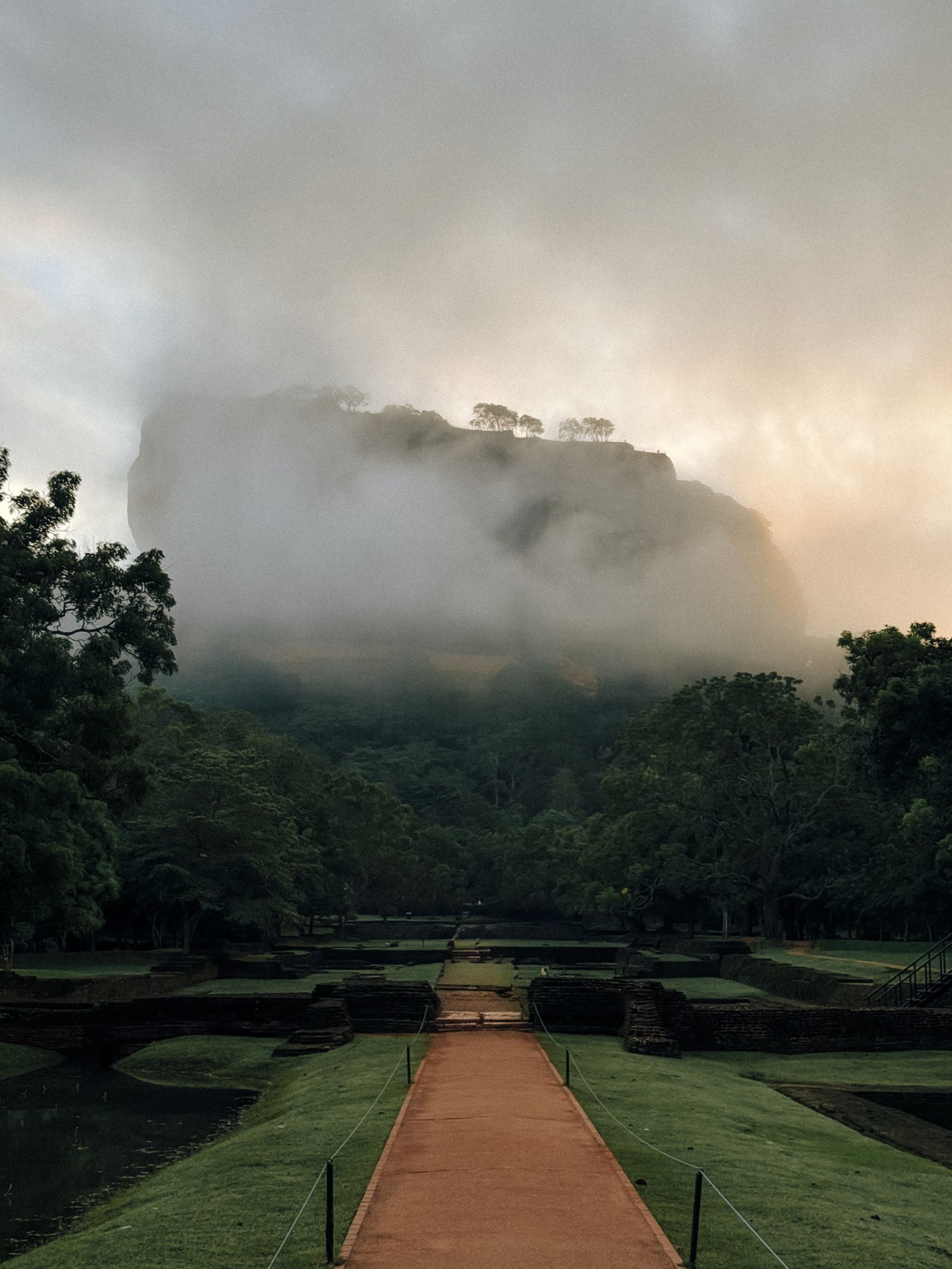 Sigiriya rock fortress in the morning mist