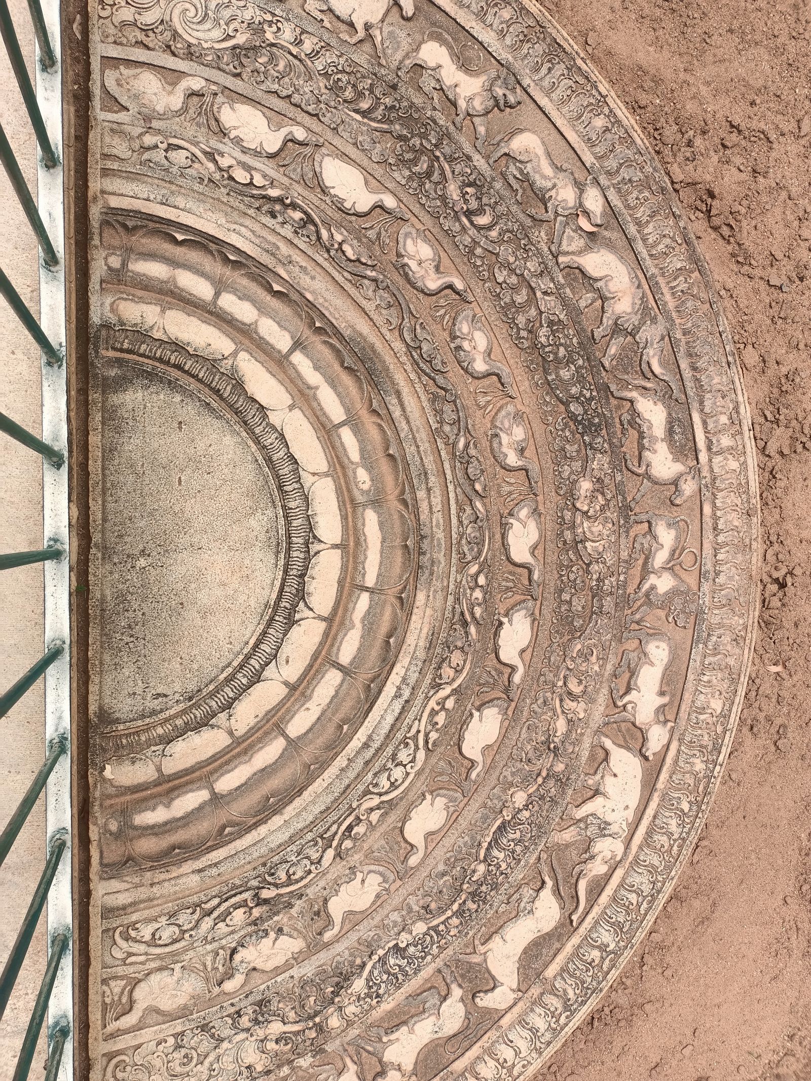 Carved moonstone at an ancient temple in Anuradhapura